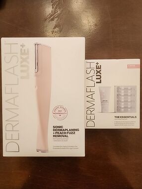 Dermaflash Luxe+ Sonic Dermaplaning Device in Light Pink & 4 Week Refill Kit